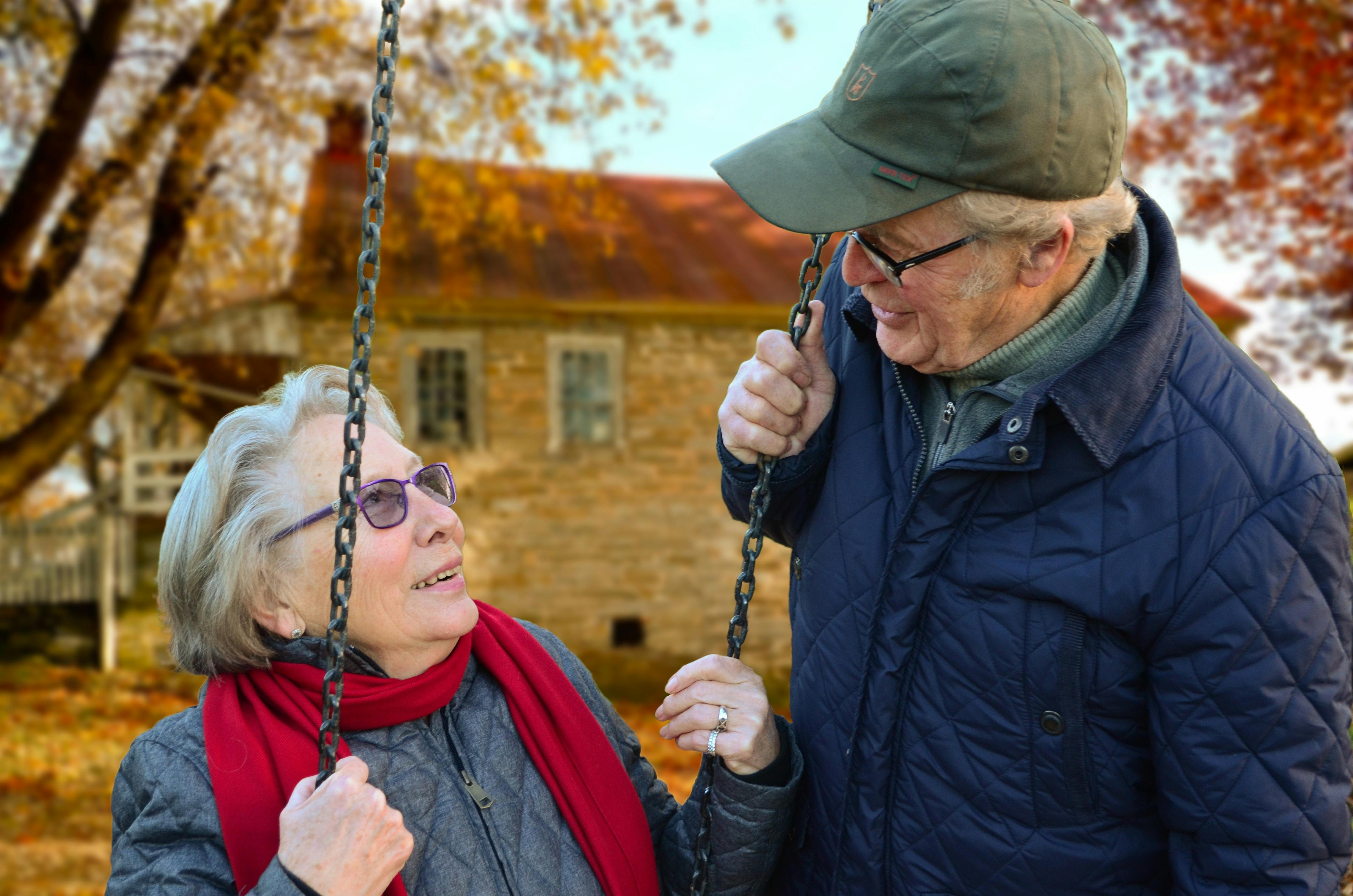 Senior man reading Medicare information at home